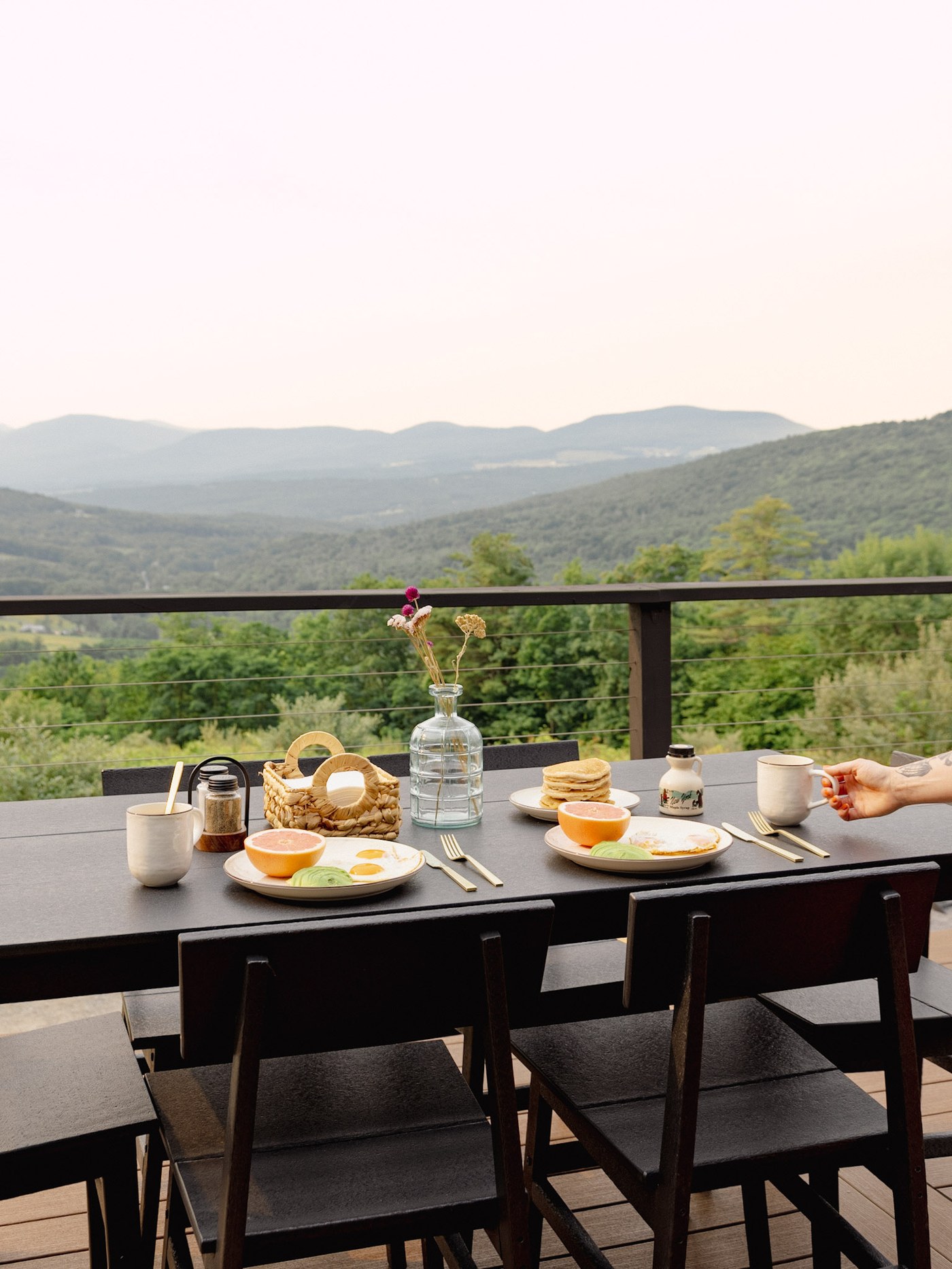 Deck breakfast table overlooking the Catskill valley