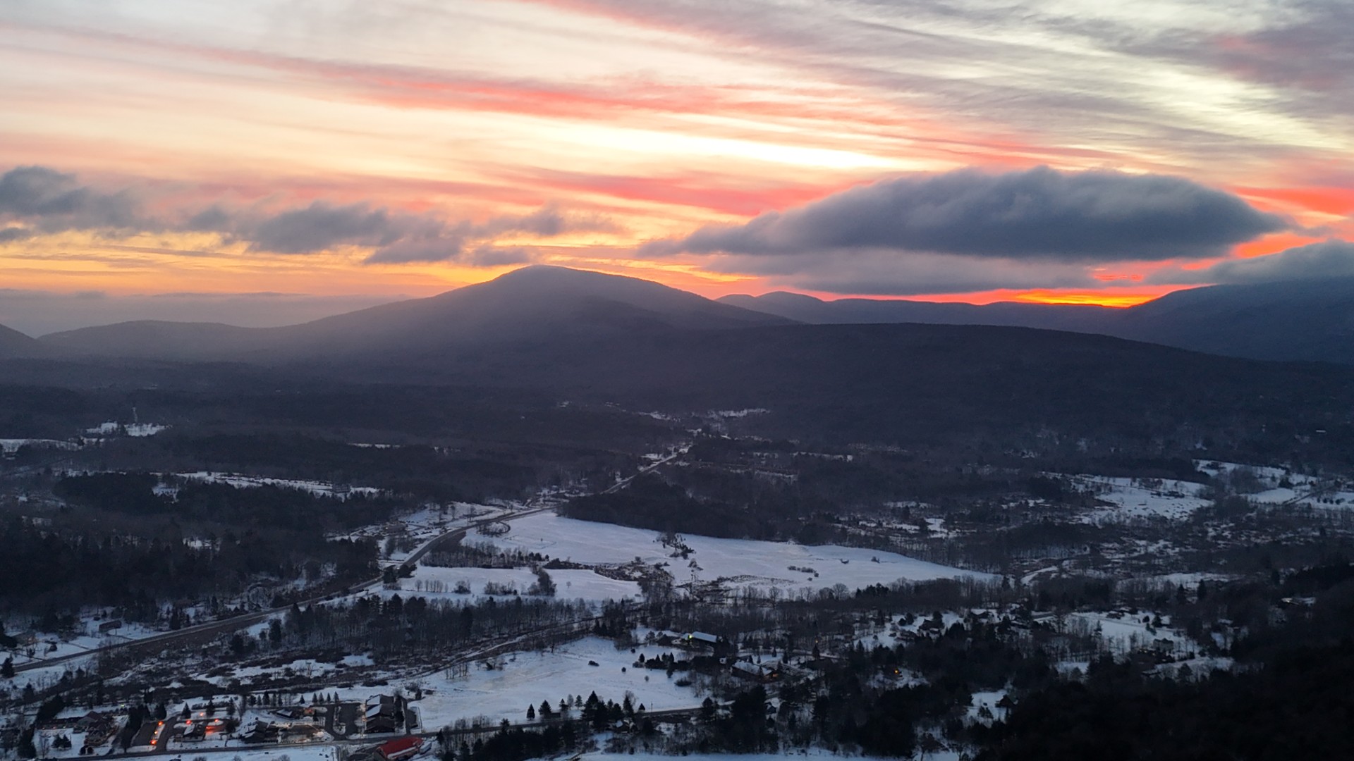 Winter sunset over the snowy landscape at Hollow Sky